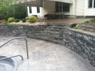 Check out the natural look and feel of the Unilock Rivercrest Retaining Wall.  Looks just like natural stone.